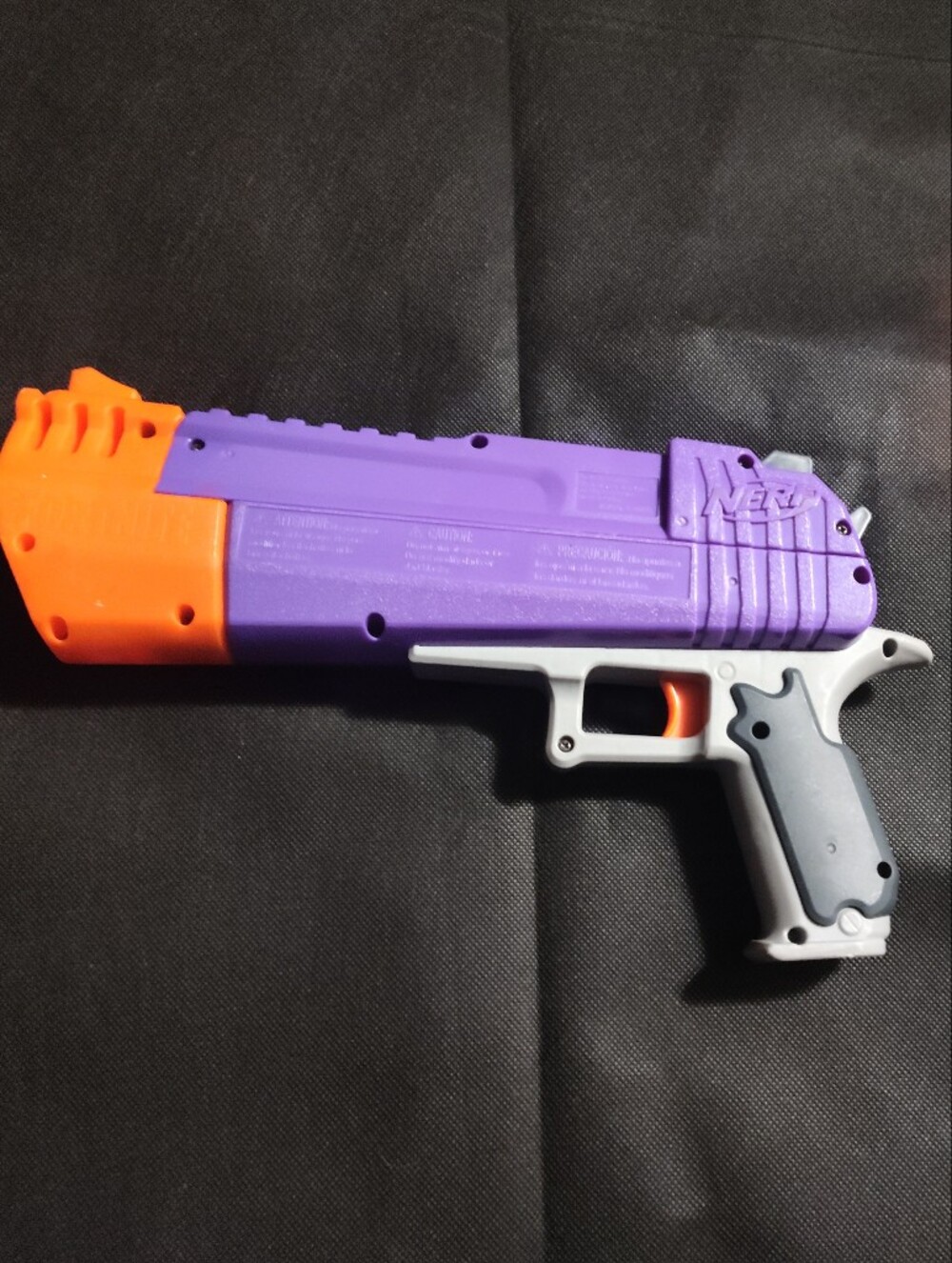 Nerf Purple and Orange Foam Blaster Pistol with Gray Handle